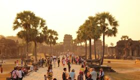 Tourists walking at Angkor Thom Temples, Siem Reap